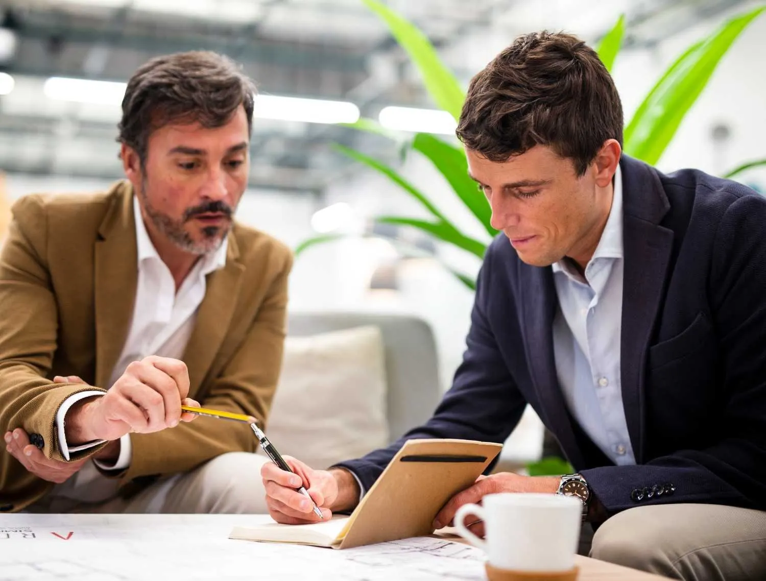 Business professionals reviewing capital funding options